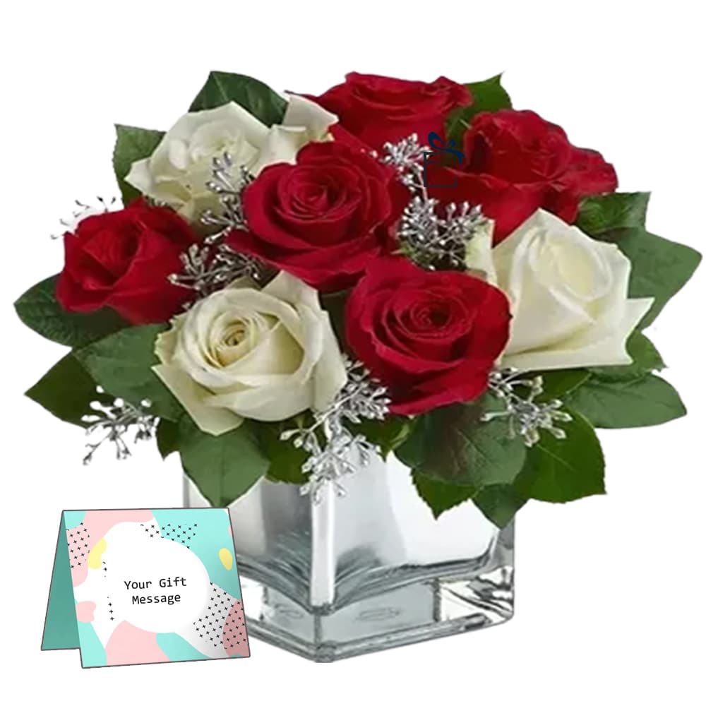 Red and White Roses in Glass Vase