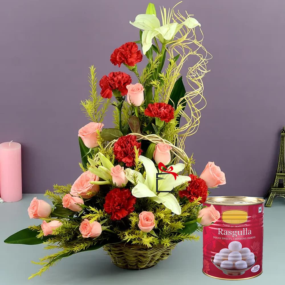 Carnation Roses with lilies Basket and Rasgulla